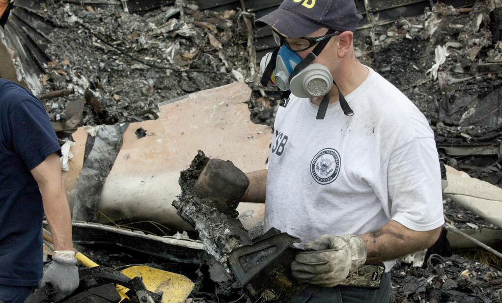 NTSB worker carries out the black box  (NTSB)